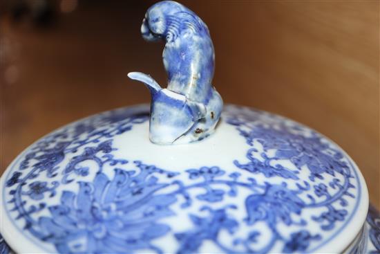 A pair of Chinese blue and white jars and covers, 19th century height 20cm